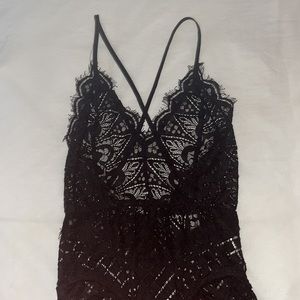 Black lace body suit